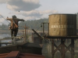 RDR2 HandsOnPreviews 02 ArthurMorgan Train Town