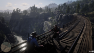 RDR2 GameplayVideoPart2 43 Radar ArthurMorgan Railway Landscape River